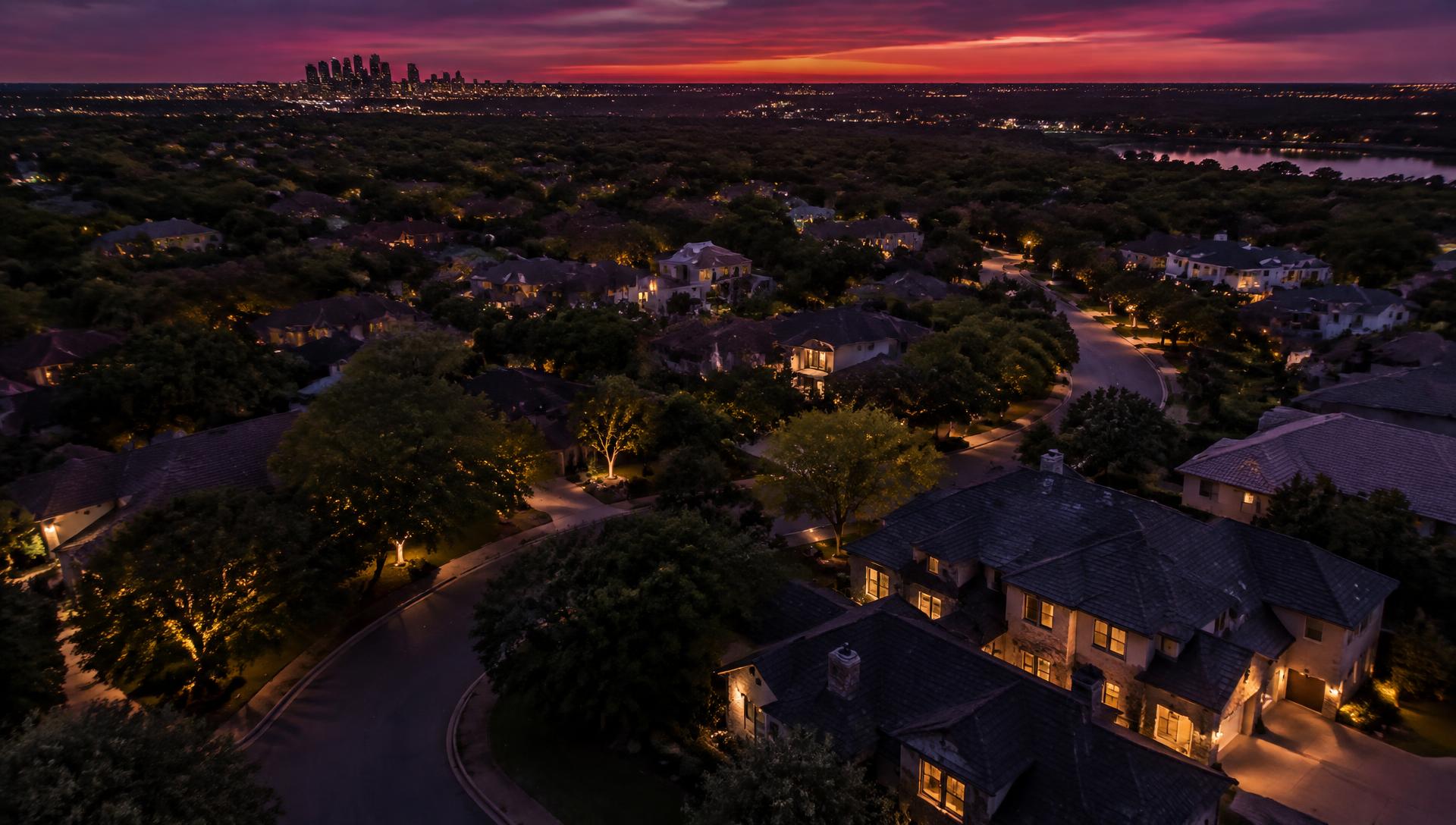 An aerial view of a residential neighbourhood at dusk.